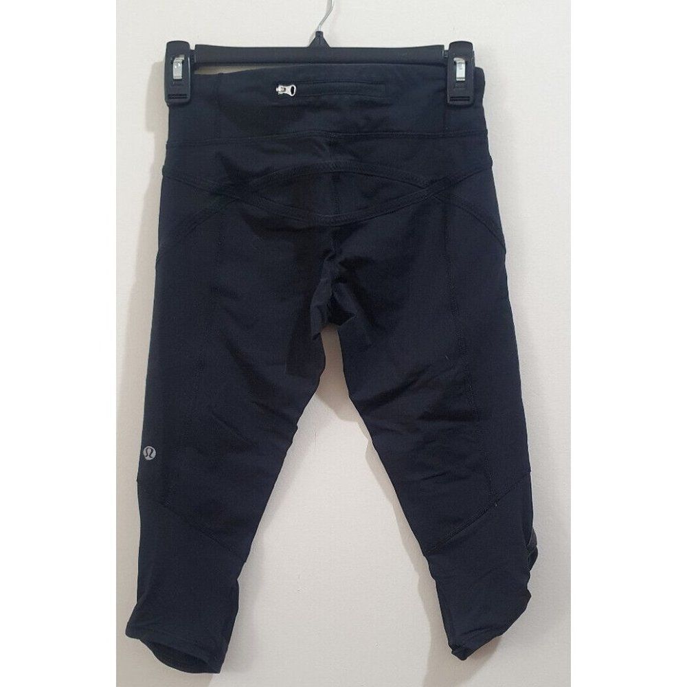 Lululemon Taryn Toomey Awakening Crop Leggings Size 4 Black Workout Active Yoga